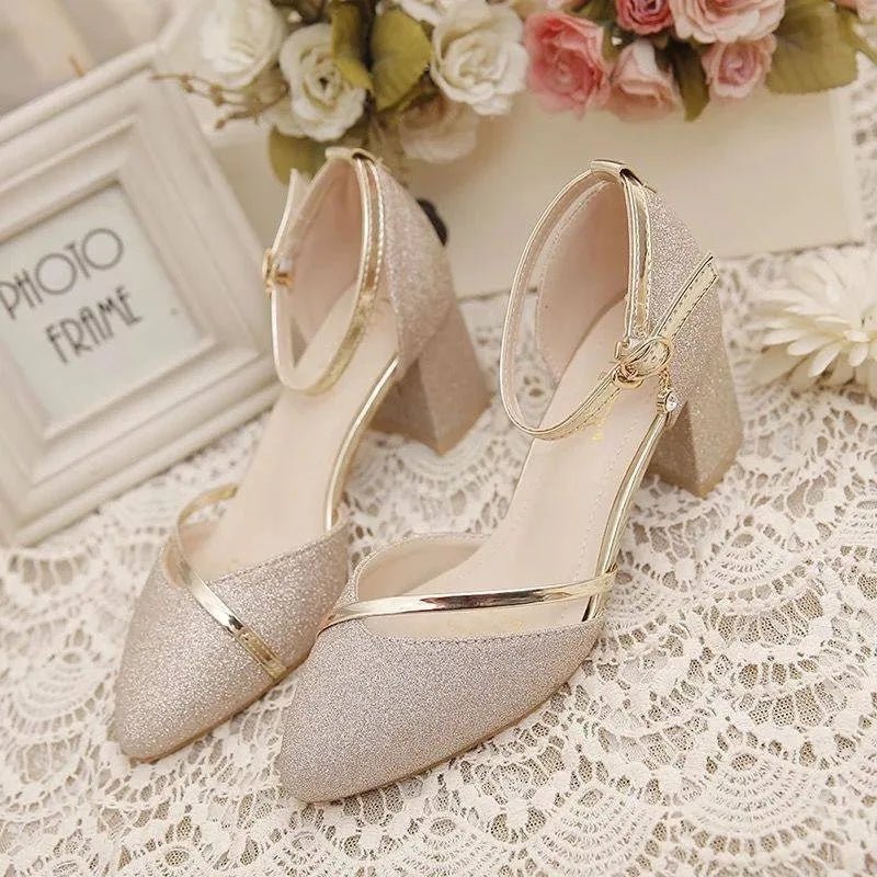 Stylish women's ankle strap block heel pumps. Modern ladies fashion heels offering comfort & elegance.