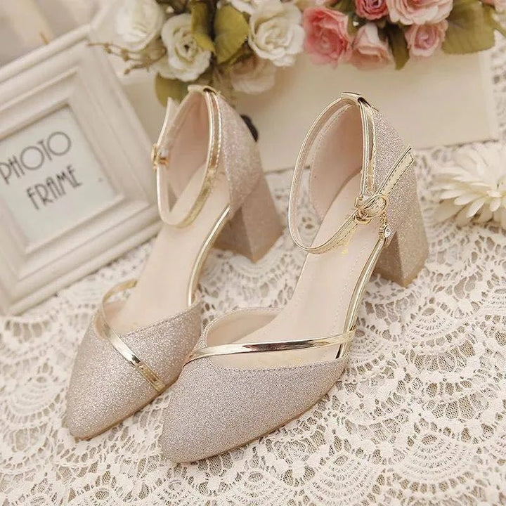 Stylish women's ankle strap block heel pumps. Modern ladies fashion heels offering comfort & elegance.