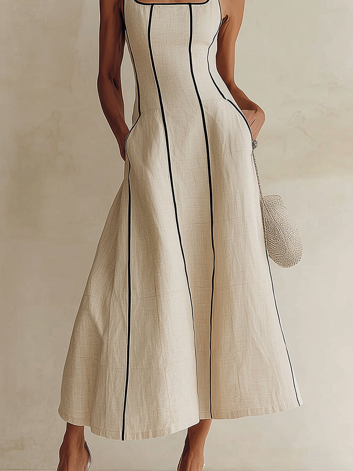 Flowy apricot party dress for women, an elegant maxi with a modern square neck and A-line cut.