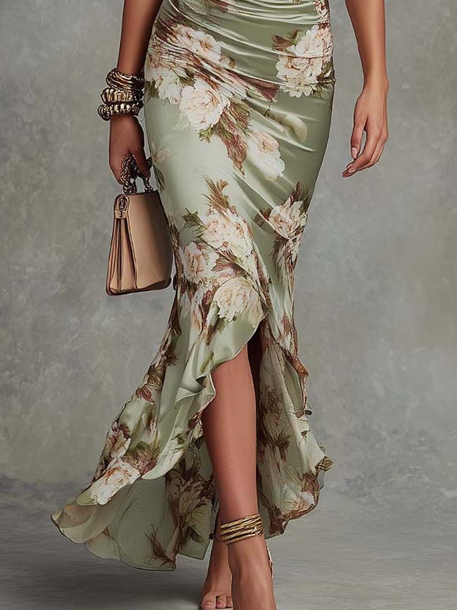 Sophisticated women's green asymmetrical maxi dress with a flowing design, great for wedding guests & formal events.