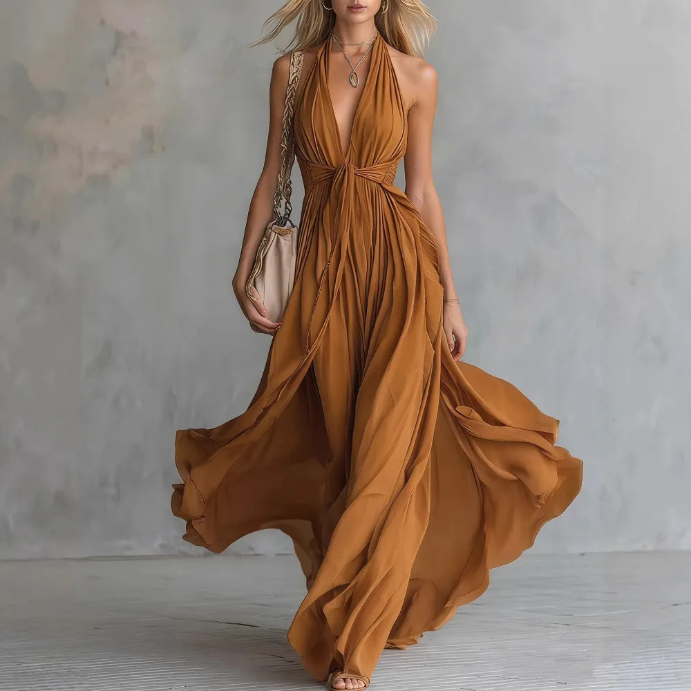 Beautiful backless halter maxi dress for women, with a sophisticated design for evening, formal or vacation style.