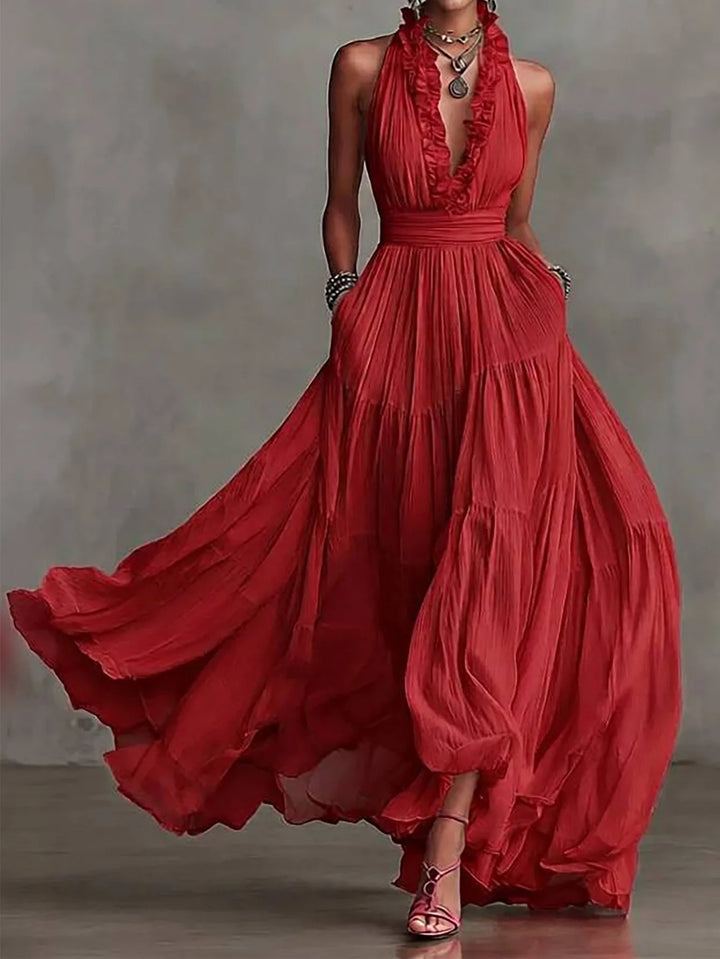 Elegant women's maxi dress in red, black or yellow, backless with ruffle trim for special occasions.