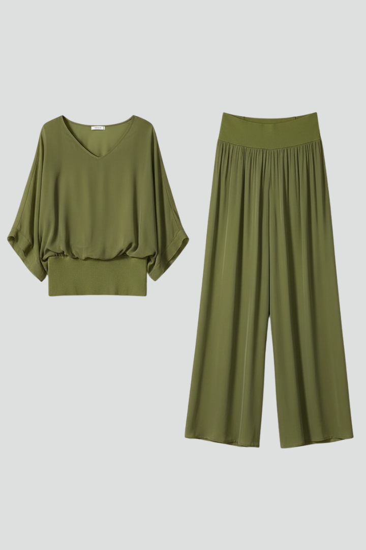 Elegant women's batwing top & wide leg pant two-piece set for chic summer fashion & party wear.