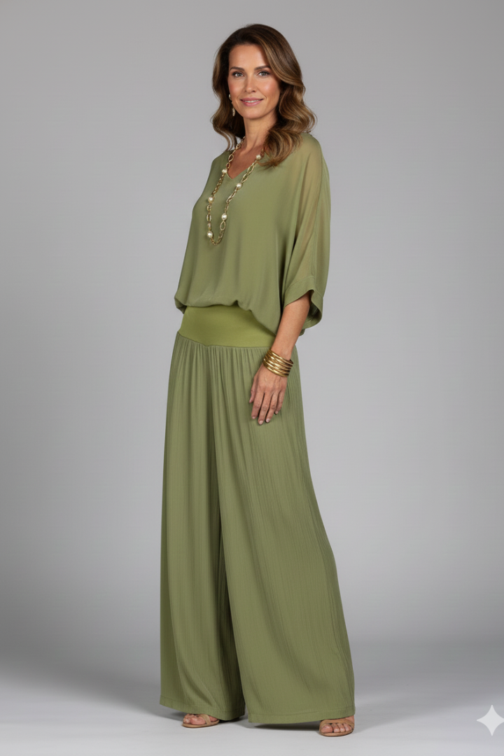 Stylish women's batwing top, part of an elegant two-piece set with wide leg pants.