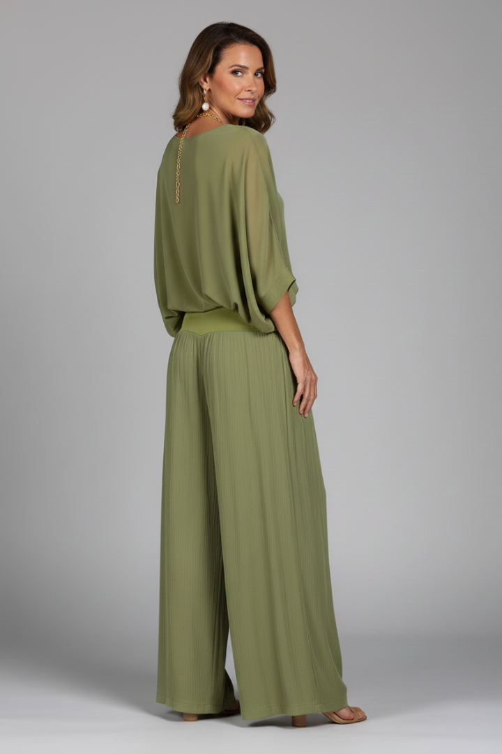 Flowing wide leg pants, part of a comfortable women's two-piece set with a batwing top.
