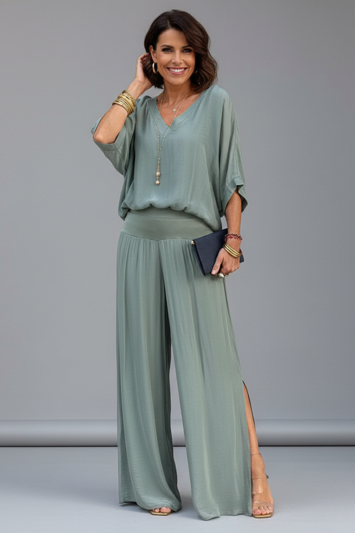 Women's elegant fashion set with a relaxed batwing top & sophisticated wide leg trousers.