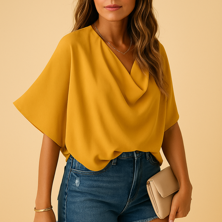 Stylish V-neck batwing sleeve top, an elegant women's blouse for a sophisticated and modern look.