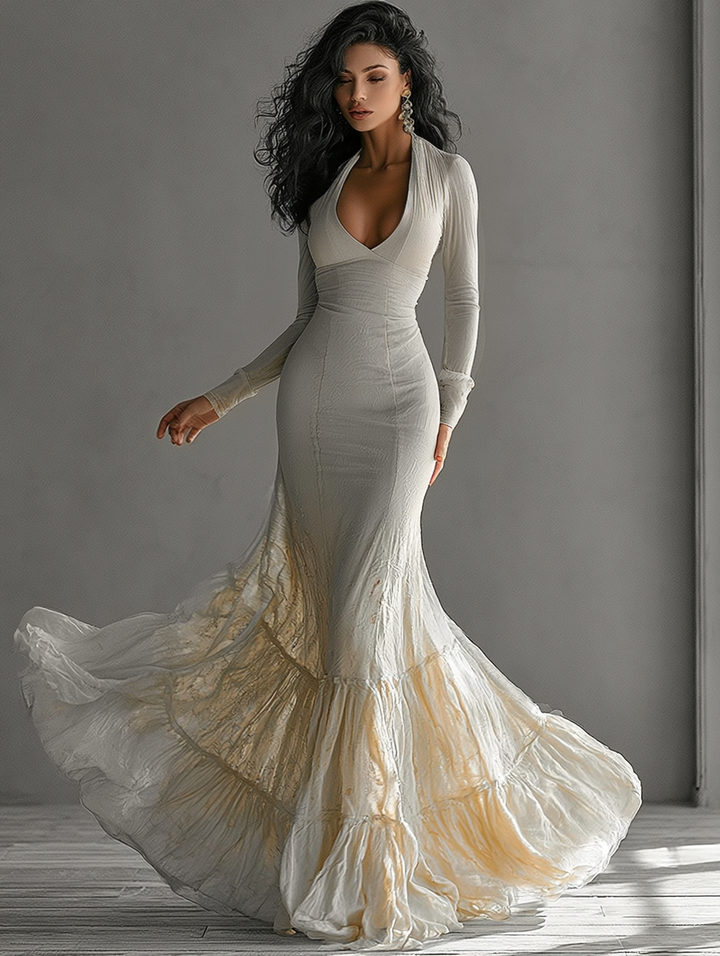 Elegant women's beige deep V maxi dress with long sleeves, mermaid silhouette, and ruffle hem for formal occasions.