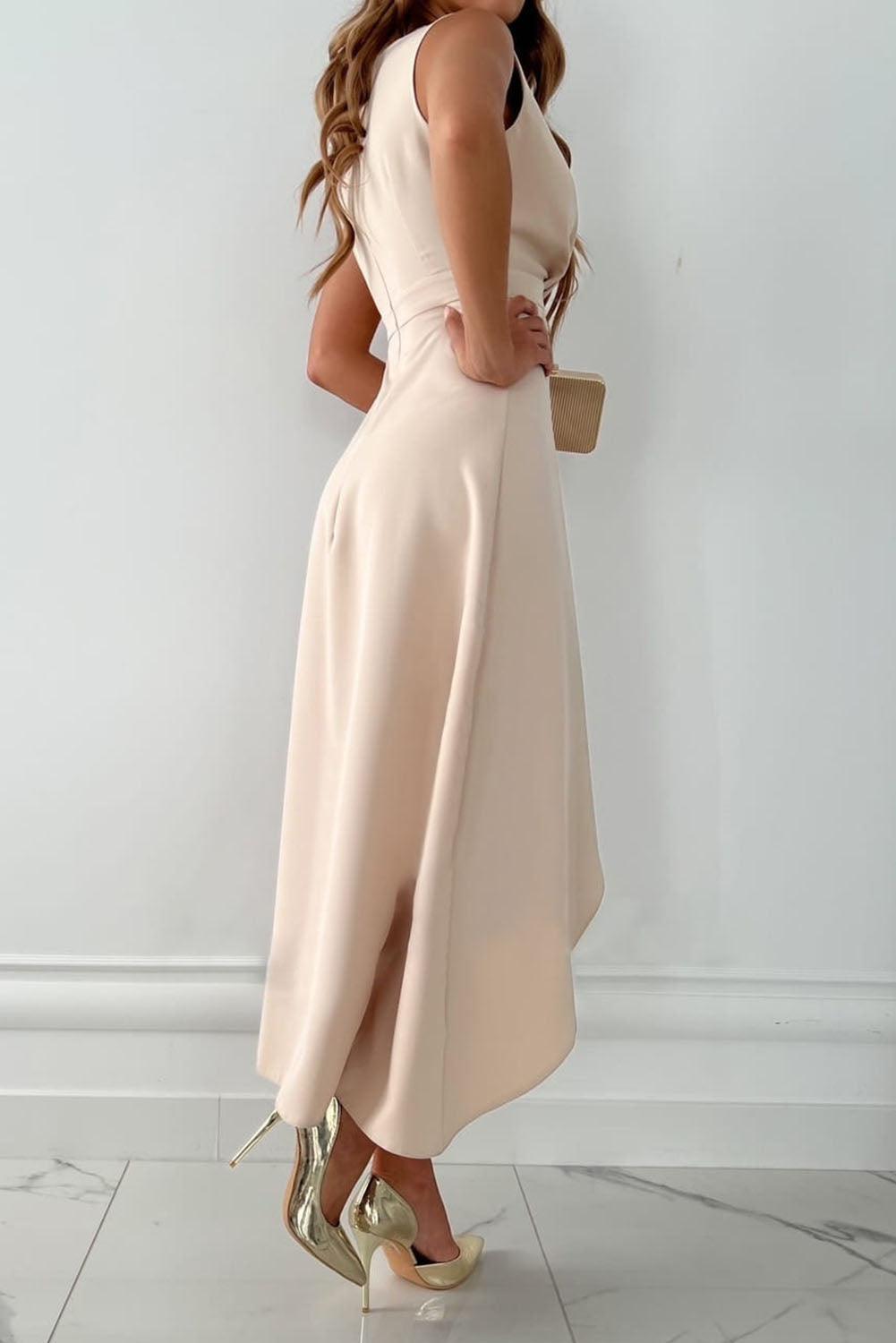 Beige wrap midi dress featuring a V-neck and adjustable tie, ideal for effortless elegance.