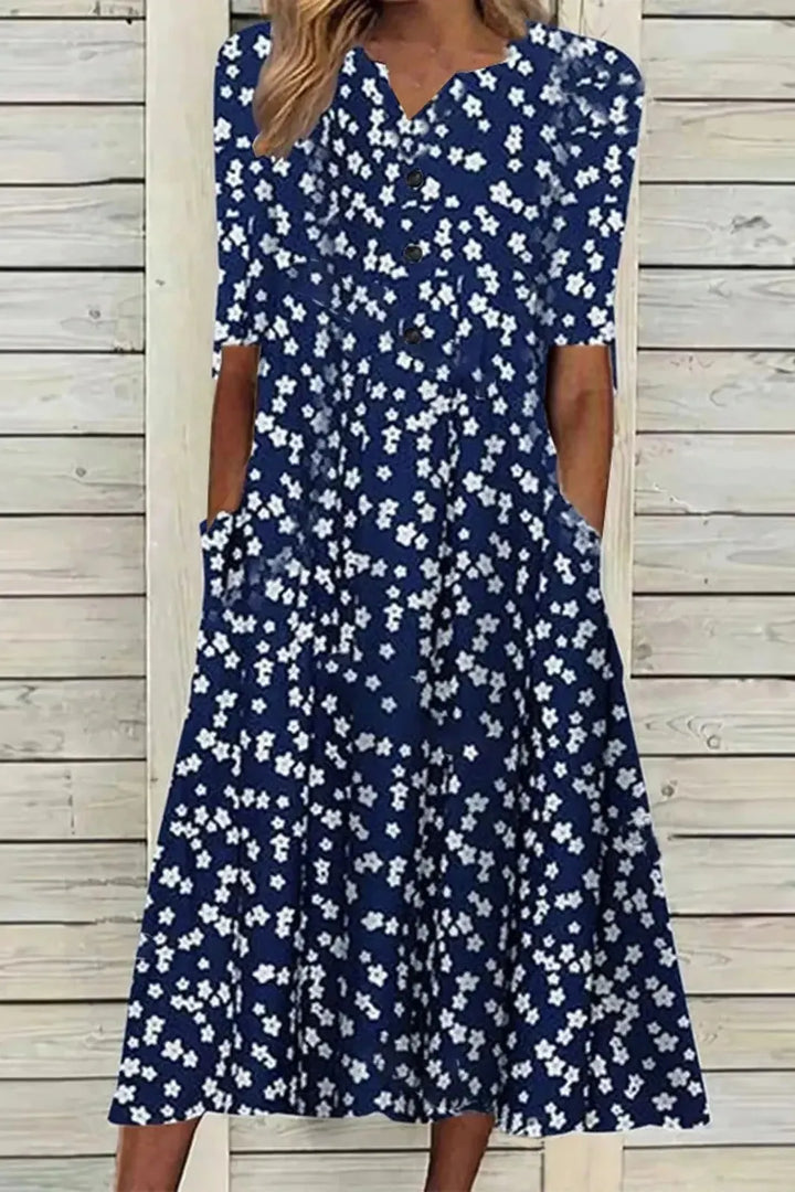 Elegant women's belted midi dress, perfect for formal occasions. Flattering A-line design defines the waist.