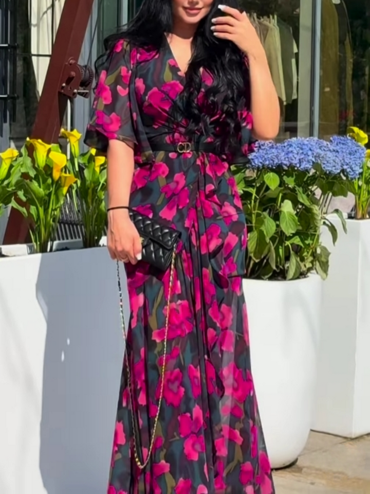 Elegant women's black floral maxi dress with V-neck & flowy trumpet sleeves, perfect for summer garden parties.