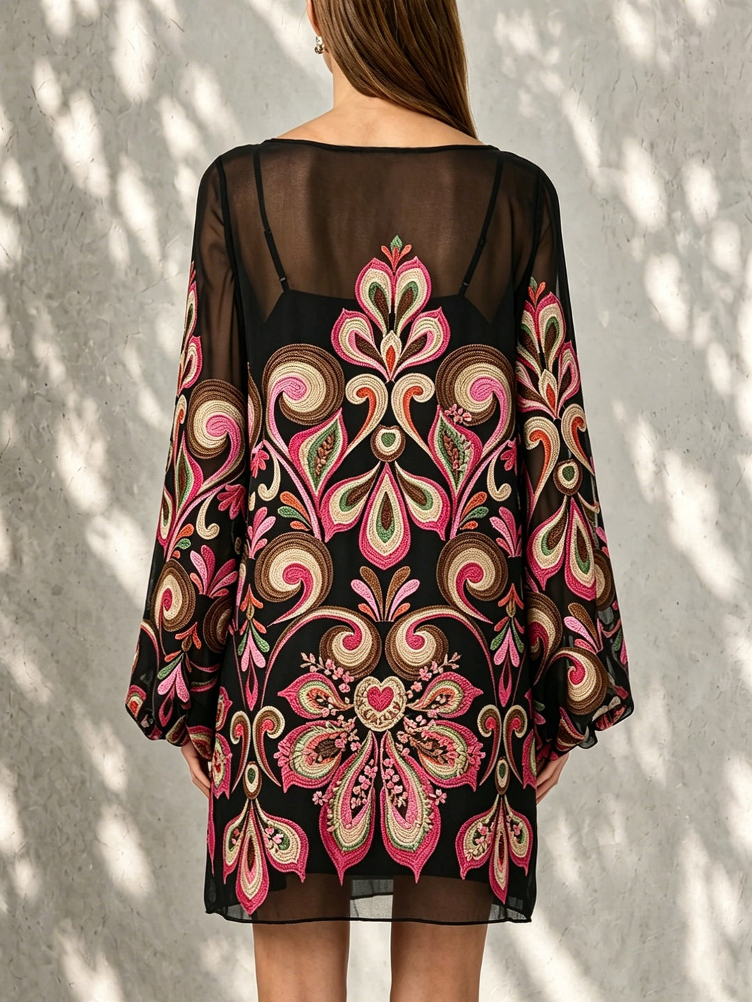 Printed black floral mini dress for women, elegant style with sheer balloon sleeves & boat neck, fashion wear.