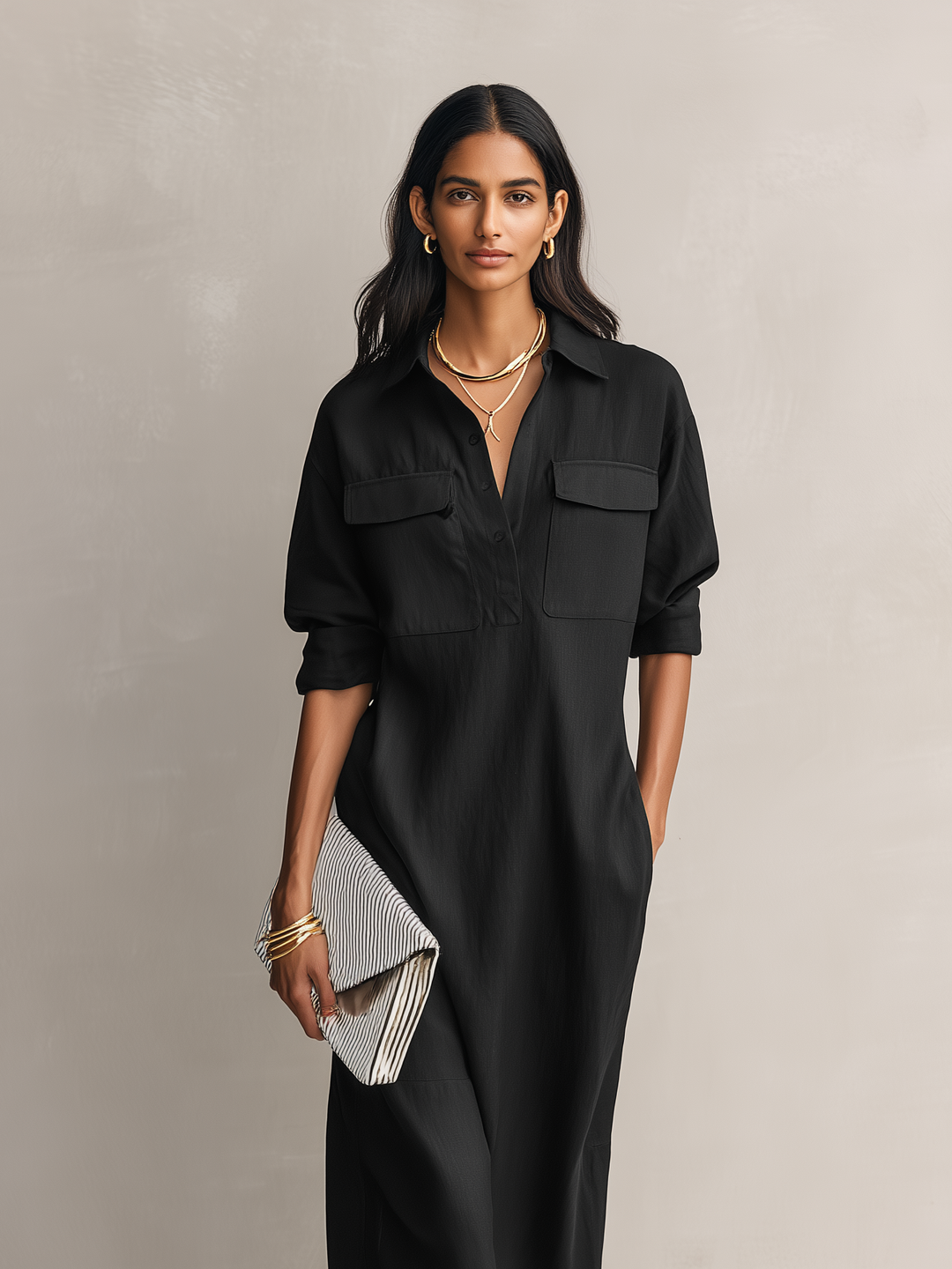 Versatile black short sleeve midi dress for women, featuring a chic shirt collar. Ideal for elegant everyday or work attire.