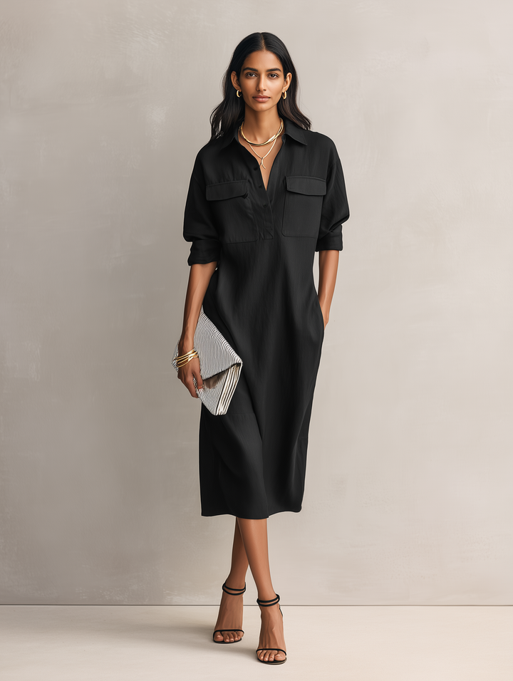 Black short sleeve midi dress for women, designed with an elegant shirt collar. A versatile piece for casual or work occasions.