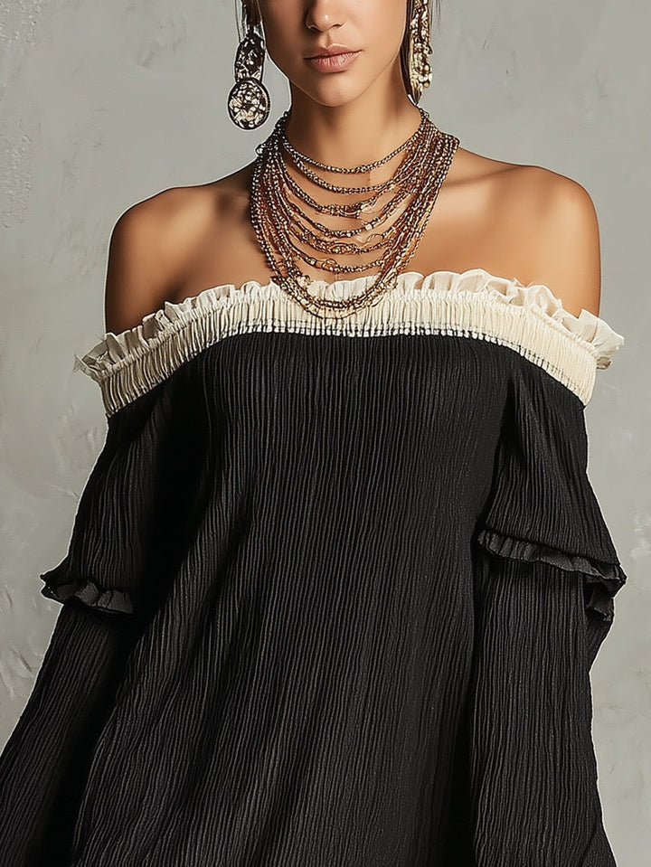 Black off-shoulder mini dress, elegant women's evening wear with ruffle sleeves and lace trim detail.