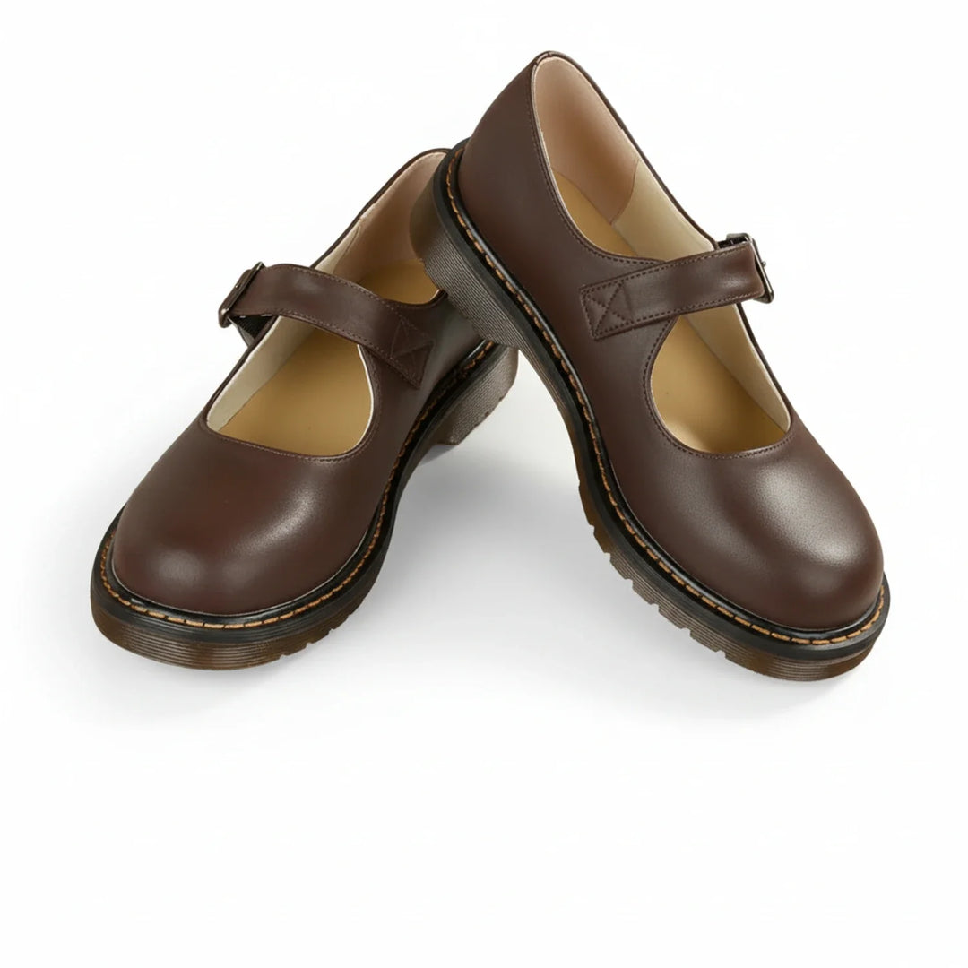 Elegant women's black platform Mary Jane shoes with a buckle strap, round toe, and comfortable vintage-modern design.
