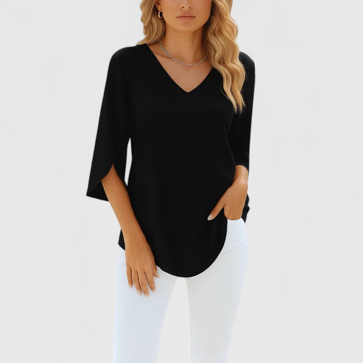 Elegant women's blouse, chic long sleeve top with split sleeve detail. Stylish & comfortable for any occasion.