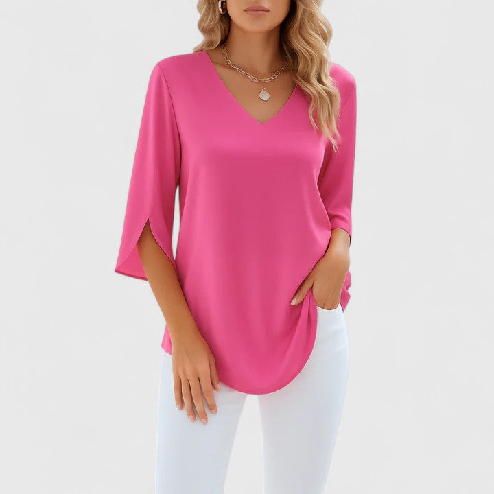 Modern ladies elegant blouse, stylish long sleeve top with unique split sleeve. Perfect for versatile wear.