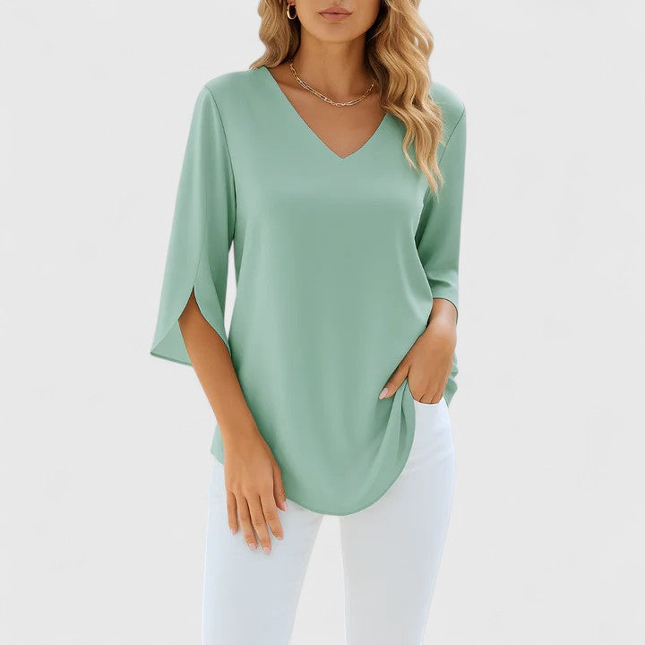 Stylish women's elegant blouse, long split sleeve top. Chic fashion piece, comfortable for any occasion.