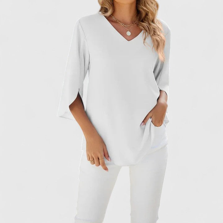 Women's fashion top, an elegant & versatile blouse for sophisticated office wear or stylish casual outfits.