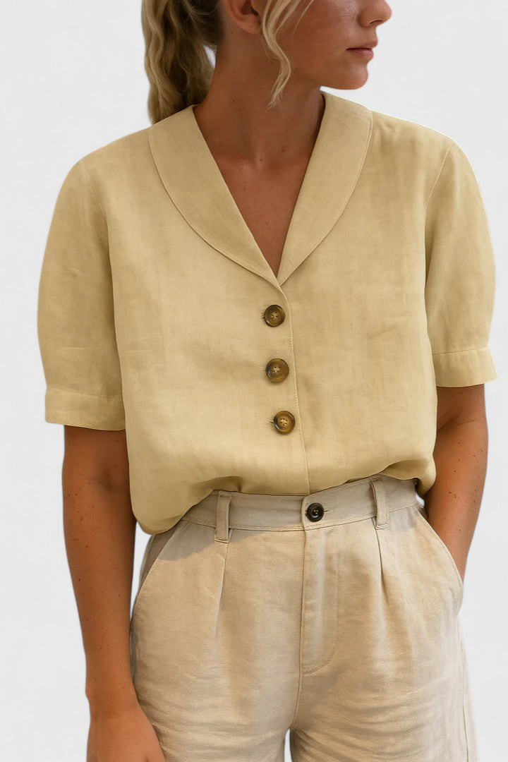 Elegant women's blouse with button details, perfect for office or casual chic wear. Breathable & versatile spring/summer top.