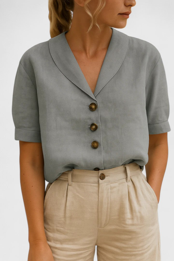 Sophisticated women's button-front blouse. Lightweight, breathable elegant shirt for versatile spring and summer fashion.