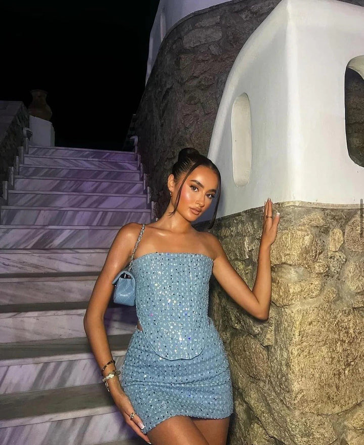 Sparkling blue sequin bodycon mini dress for women, with an elegant strapless neckline, designed for a flattering fit.