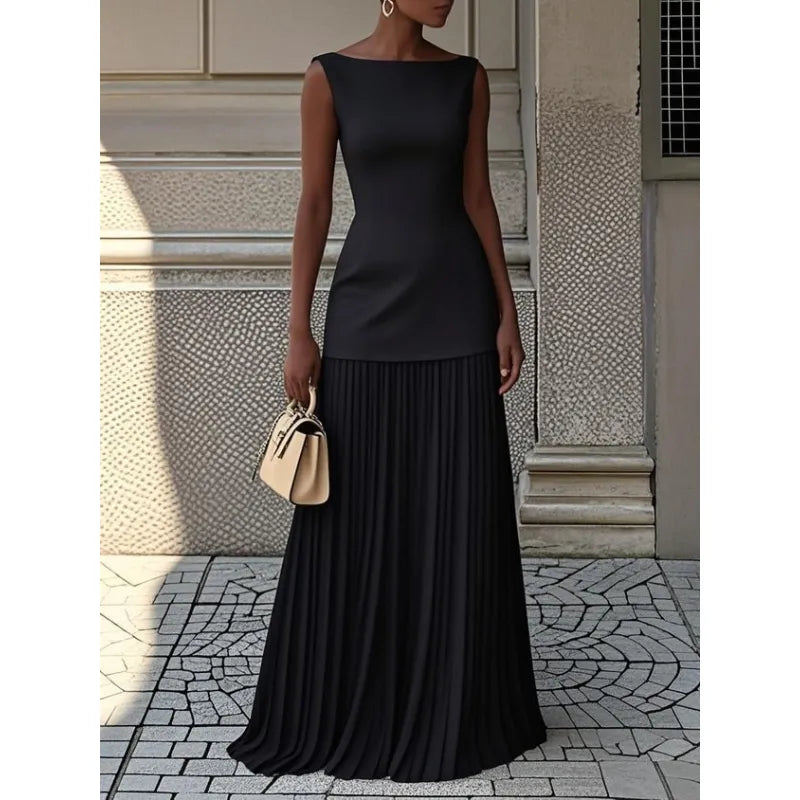 Flowy boat neck maxi dress for women. Pleated sleeveless design, ideal for elegant casual chic or special occasions.