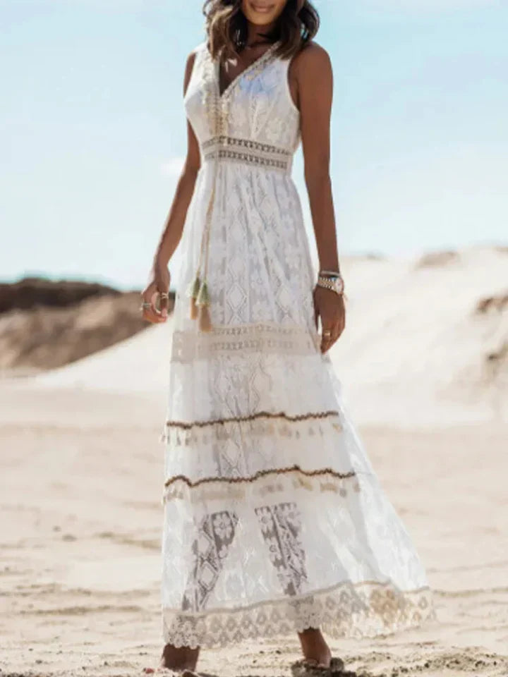 New women's bohemian maxi dress, casual & elegant, with beautiful lace trim, v-neck, & graceful flared sleeves.