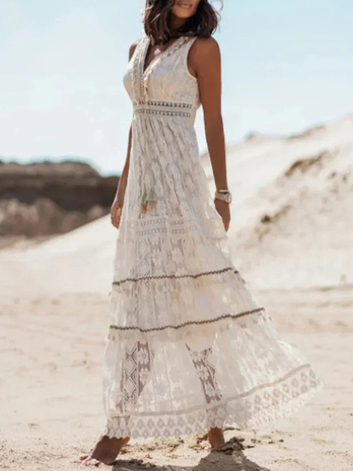 Comfortable women's boho maxi dress with soft lace detailing, flowy silhouette, and stylish flared sleeves.