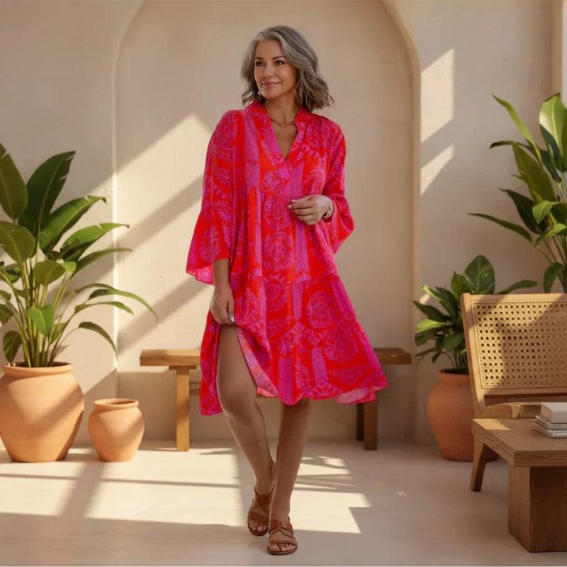 Elegant Women's Boho Chic Midi Dress with vibrant pattern, perfect for summer casual or vacation wear.