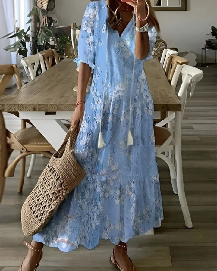 Women's elegant floral maxi dress, perfect beachwear or vacation style. Bohemian, flowy & comfortable.