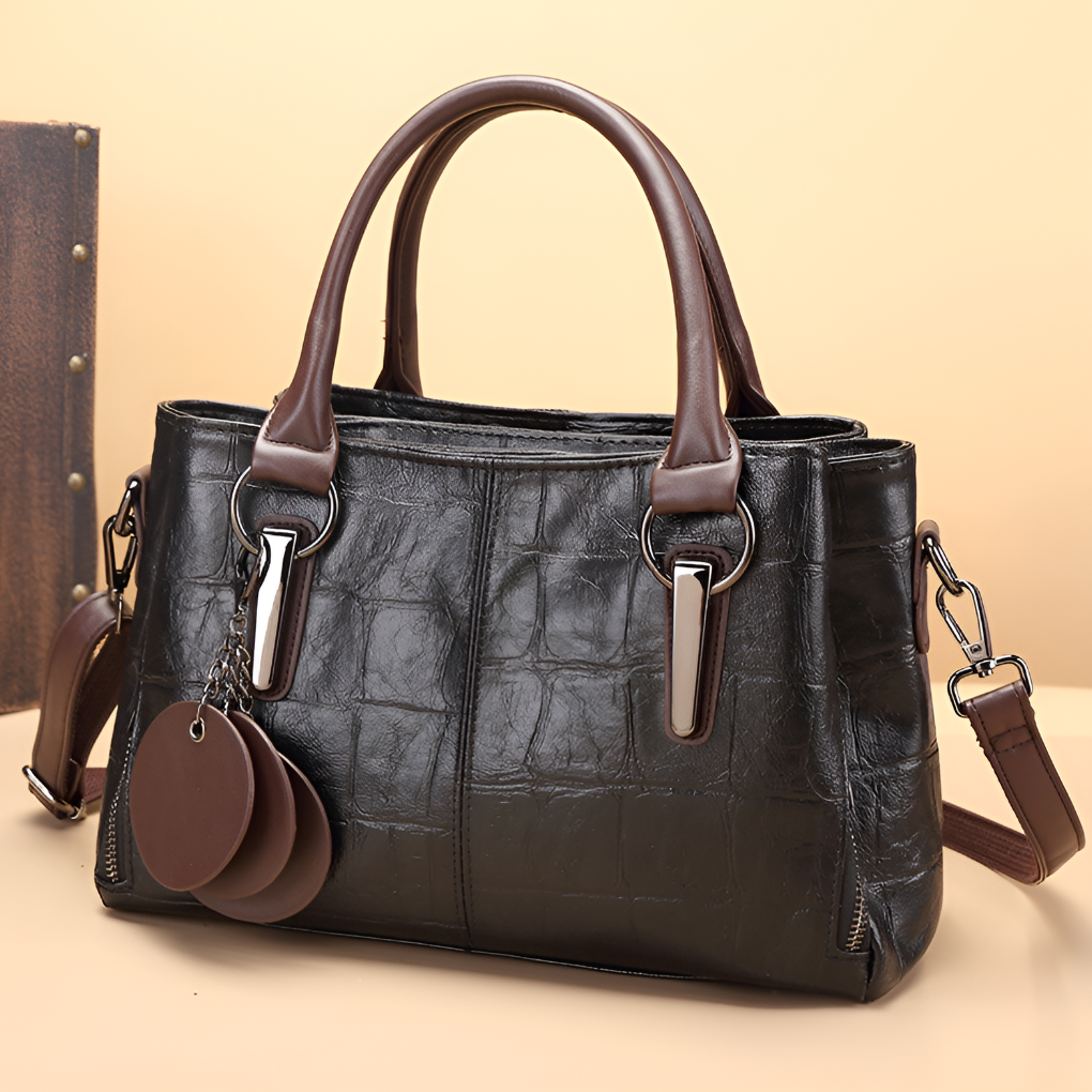 Chic women's shoulder bag: a versatile Boston handbag with stylish croc embossing, ideal for any elegant outfit.