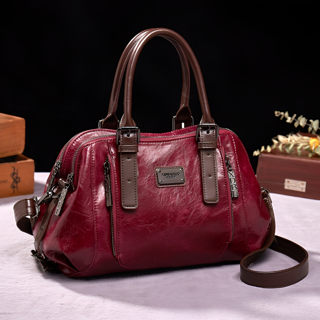 Luxurious croc-embossed women's Boston handbag. An elegant shoulder bag and fashion accessory for sophisticated daily wear.