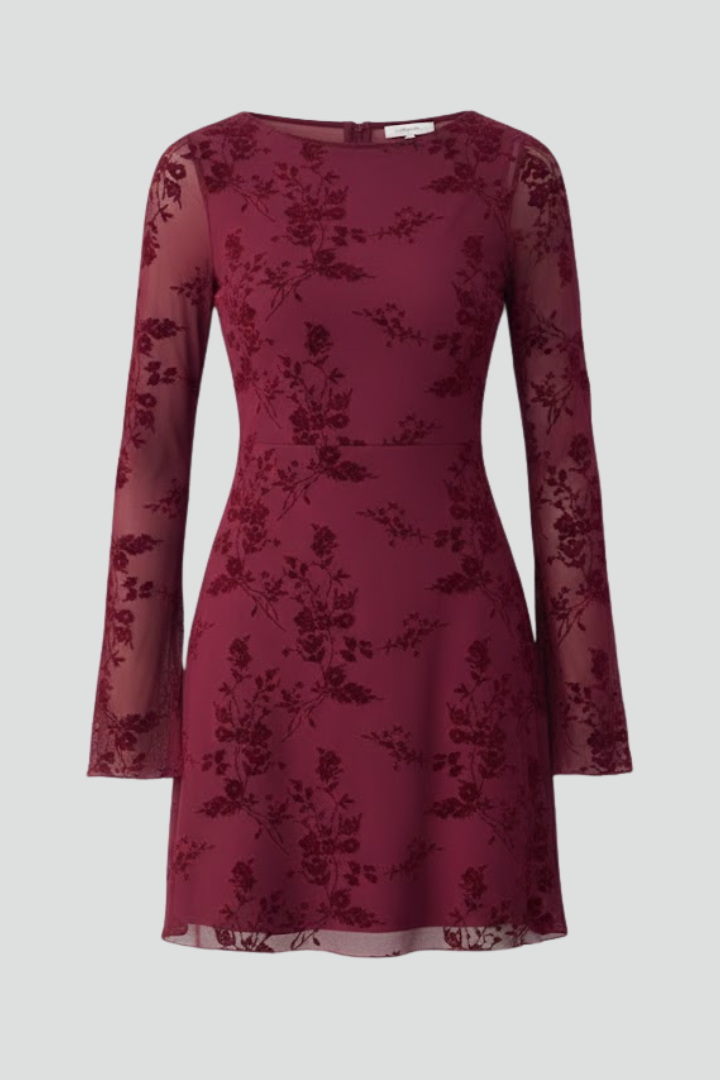 Elegant women's burgundy floral mini dress with ruched waist and long sleeves.