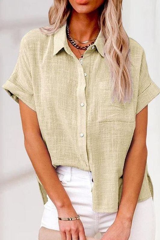 Versatile women's button-up shirt. Elegant long sleeve blouse transitions from casual to professional everyday style.