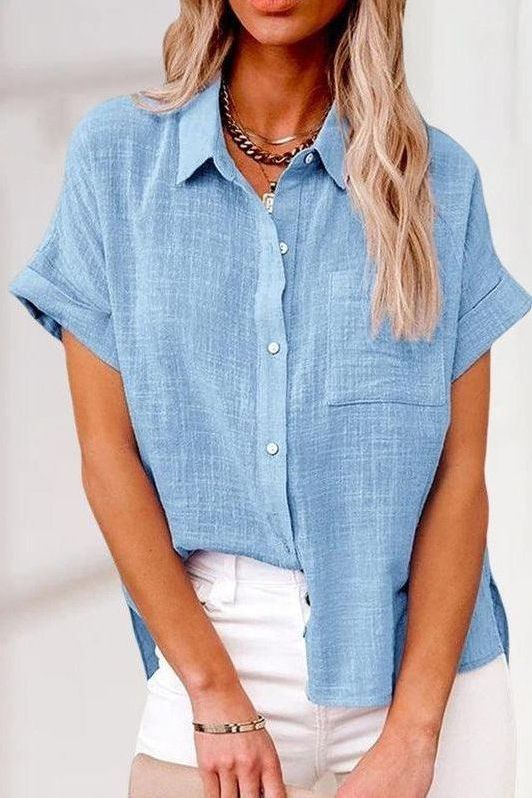 Women's elegant button-up shirt, long sleeve, tailored fit. Versatile workwear and casual blouse for women.