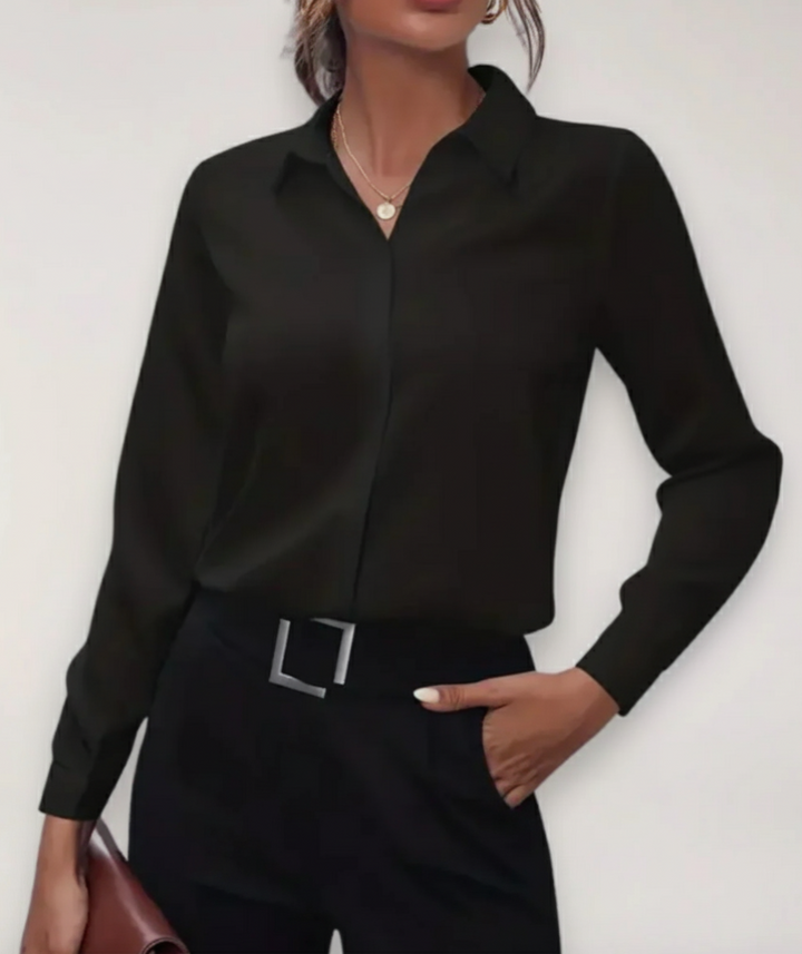 Elegant women's buttoned office blouse for a professional, chic look. Perfect for work attire & business casual.