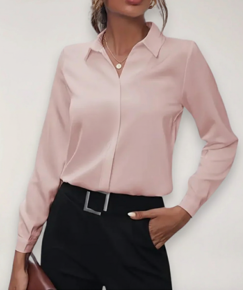Chic long-sleeve women's blouse, buttoned front, ideal for office wear & professional women. Comfortable fit.