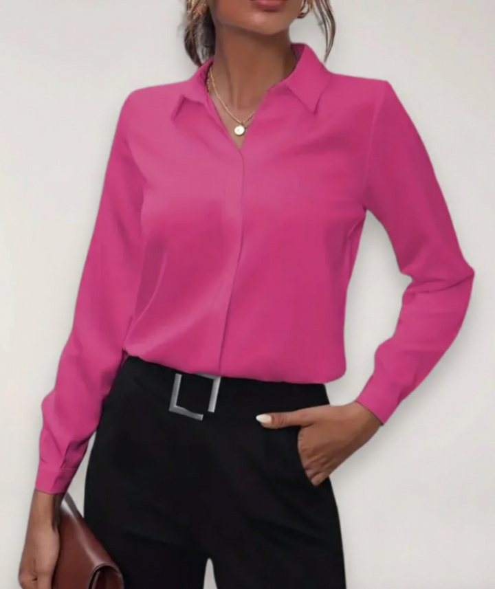 Versatile elegant buttoned blouse for women, perfect as a professional top or business casual work attire.