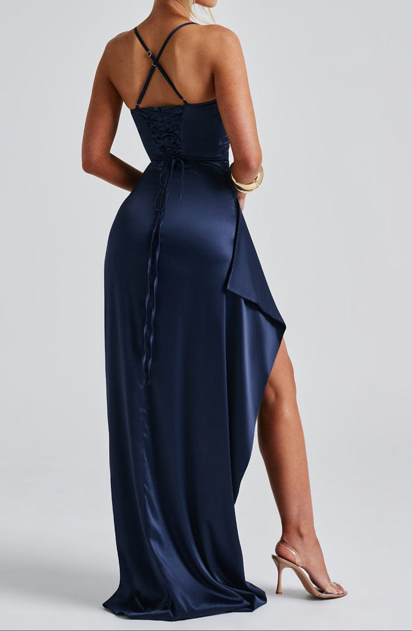Chic women's evening gown: a strappy blue maxi dress with an elegant slit, ideal for formal events & parties.