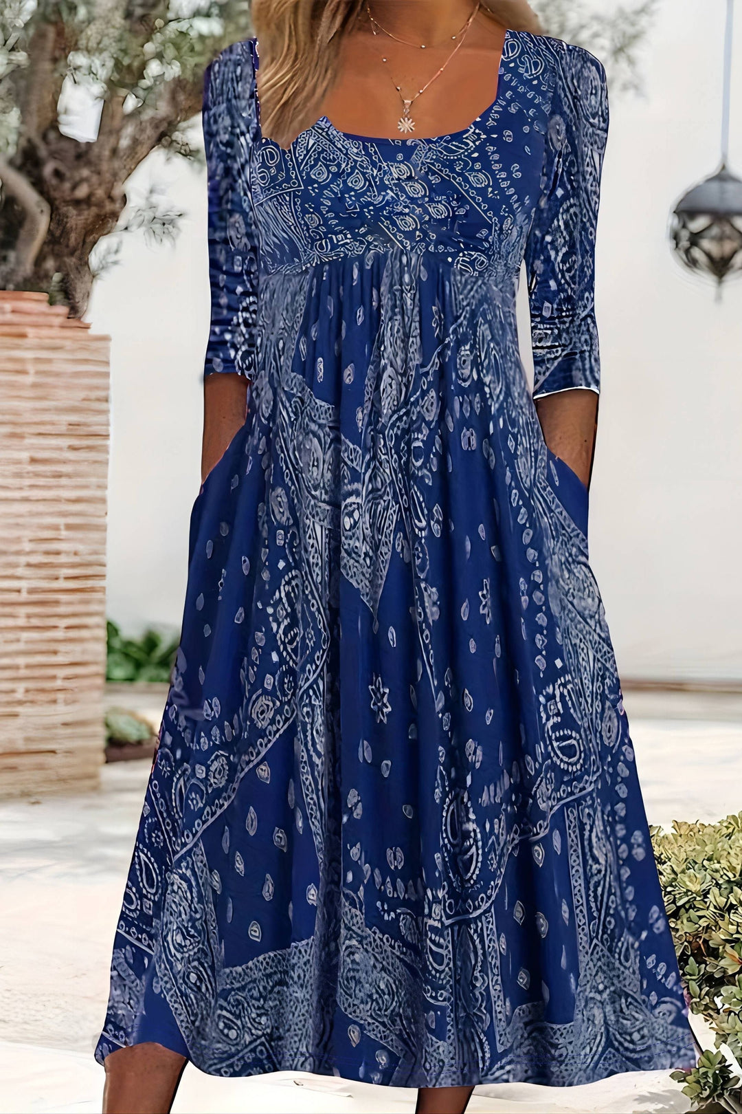 Sophisticated women's A-line midi dress, a classic elegant style, perfect for versatile work wear and cocktail events.