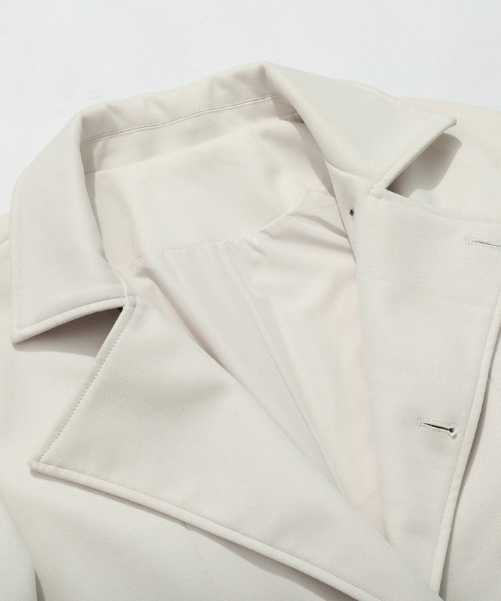Stylish women's white trench coat, a timeless and elegant outerwear garment for spring & fall.