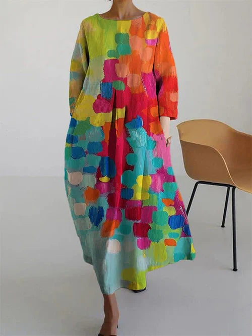 Colorful long-sleeve maxi dress for women, featuring an elegant color-block design. Versatile for casual summer fashion.