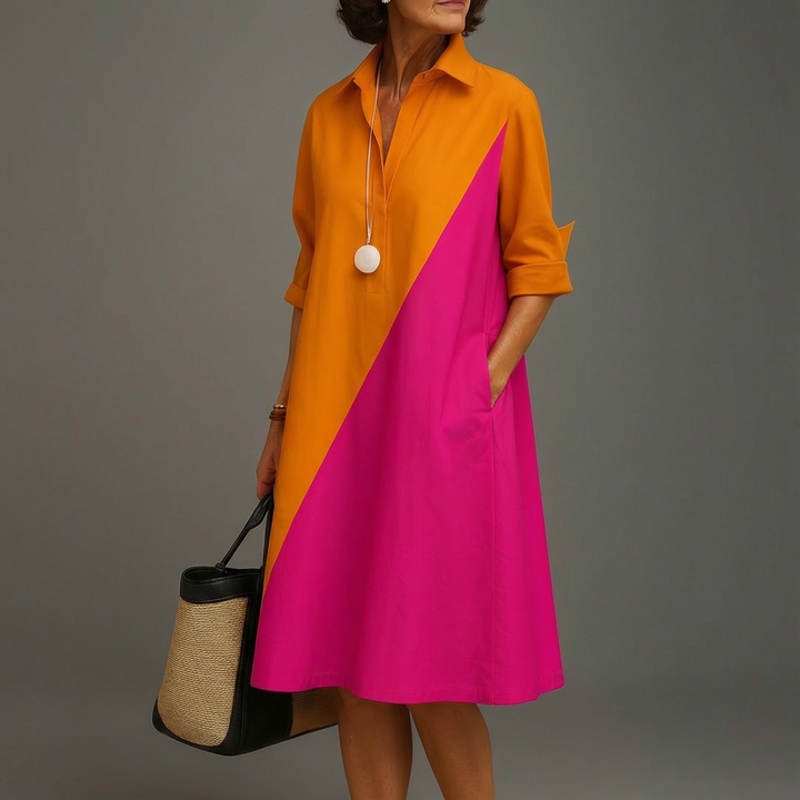 Elegant women's color-block midi dress with long sleeves, perfect for stylish spring and fall events.