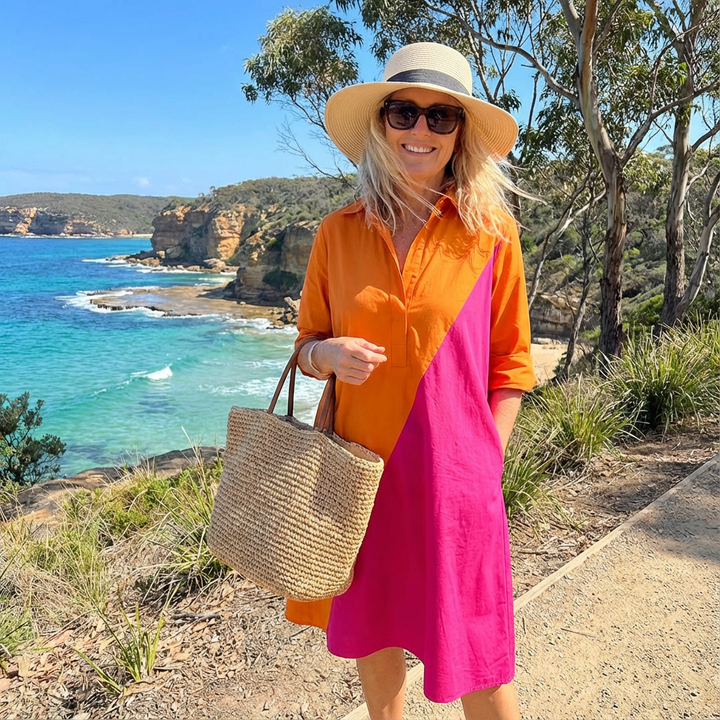 Comfortable women's long sleeve color-block midi dress, button-down style for versatile casual or event wear.