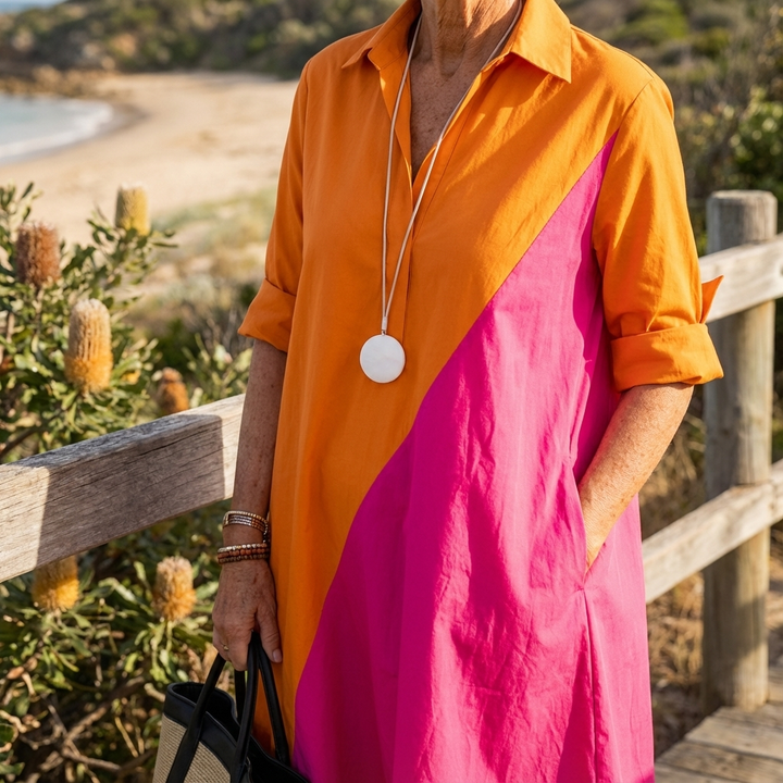 Chic long-sleeve color-block midi dress for women, offering elegant style for various occasions.
