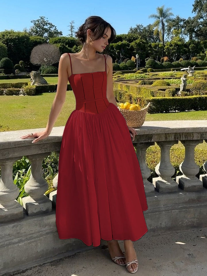 Women's formal occasion wear: a chic corset midi dress for guests, showcasing intricate design