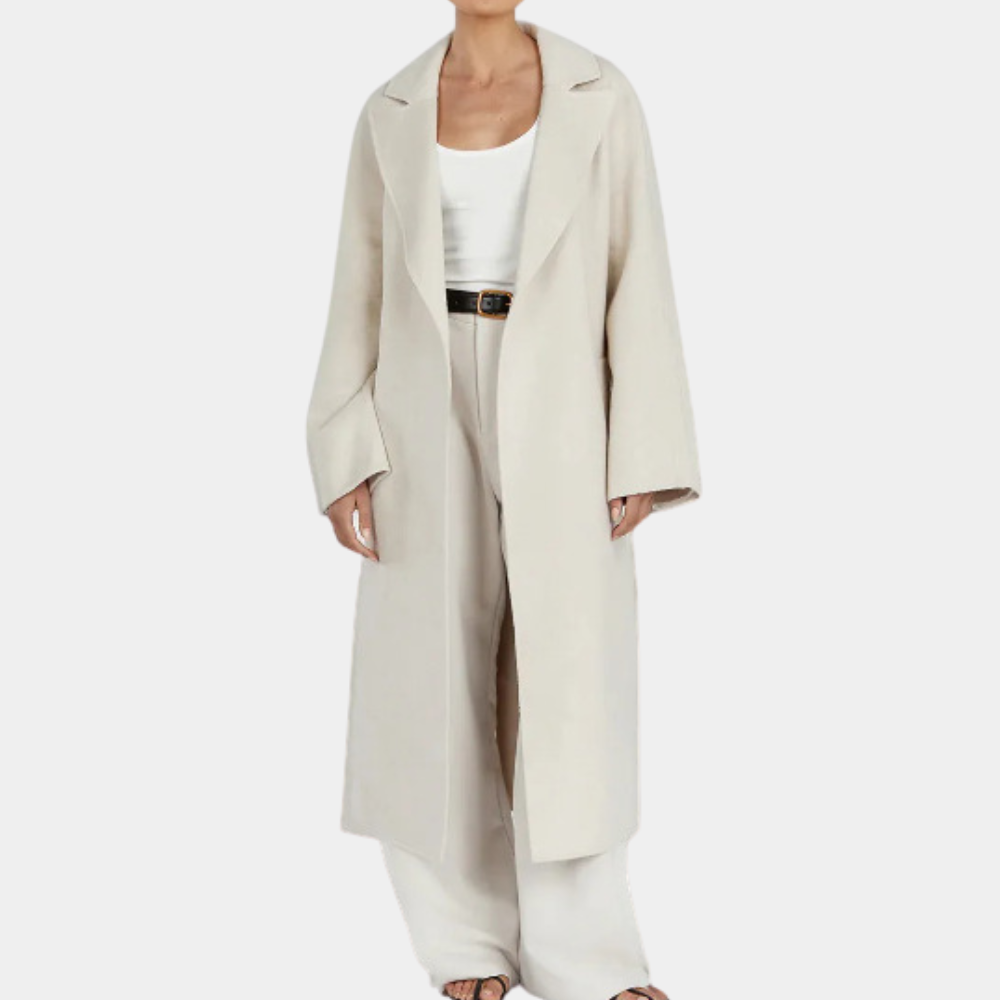 Elegant women's cream white long trenchcoat with oversized fit & belted waist, perfect for fall fashion outerwear.
