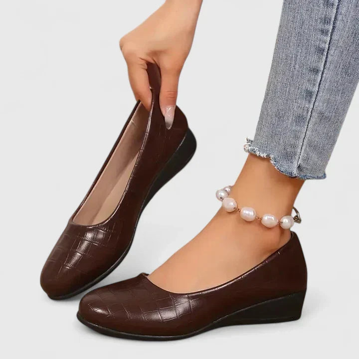 Elegant women's croc embossed square toe wedge loafers. Versatile slip-on comfort shoes for office wear.